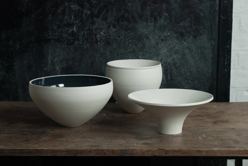 Porcelain bowls with contrasting glazed interiors